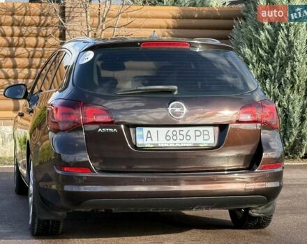 Коричневый Опель Астра, объемом двигателя 1.6 л и пробегом 165 тыс. км за 7698 $, фото 23 на Automoto.ua