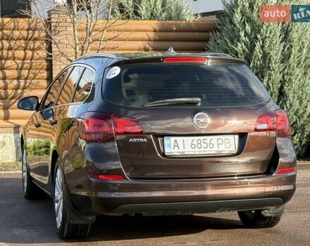 Коричневый Опель Астра, объемом двигателя 1.6 л и пробегом 165 тыс. км за 7698 $, фото 22 на Automoto.ua