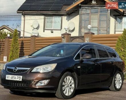 Коричневый Опель Астра, объемом двигателя 1.6 л и пробегом 165 тыс. км за 7698 $, фото 6 на Automoto.ua
