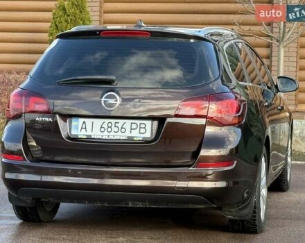 Коричневый Опель Астра, объемом двигателя 1.6 л и пробегом 165 тыс. км за 7698 $, фото 25 на Automoto.ua