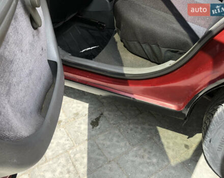 Красный Опель Астра, объемом двигателя 1.6 л и пробегом 332 тыс. км за 2100 $, фото 38 на Automoto.ua