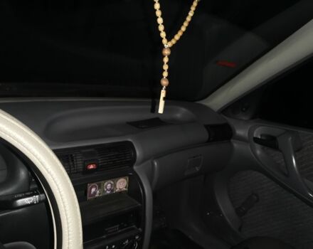 Красный Опель Астра, объемом двигателя 1.4 л и пробегом 350 тыс. км за 1700 $, фото 5 на Automoto.ua