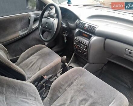 Червоний Опель Астра, об'ємом двигуна 1.39 л та пробігом 300 тис. км за 1700 $, фото 6 на Automoto.ua