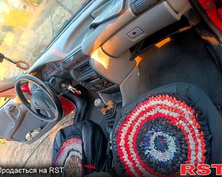 Красный Опель Астра, объемом двигателя 1.6 л и пробегом 215 тыс. км за 2000 $, фото 5 на Automoto.ua