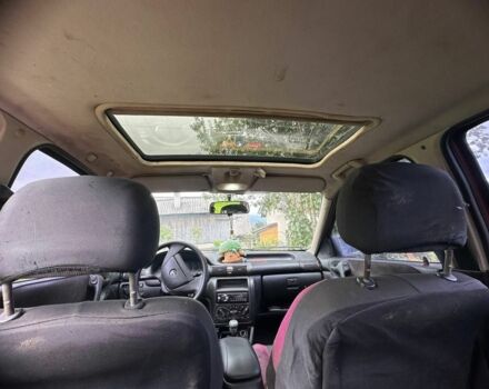 Красный Опель Астра, объемом двигателя 1.6 л и пробегом 390 тыс. км за 1550 $, фото 9 на Automoto.ua