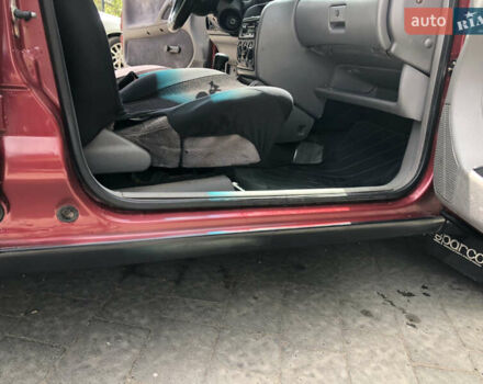 Красный Опель Астра, объемом двигателя 1.6 л и пробегом 332 тыс. км за 2100 $, фото 28 на Automoto.ua