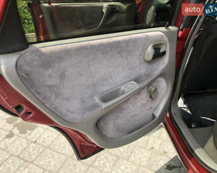 Красный Опель Астра, объемом двигателя 1.6 л и пробегом 332 тыс. км за 2100 $, фото 37 на Automoto.ua