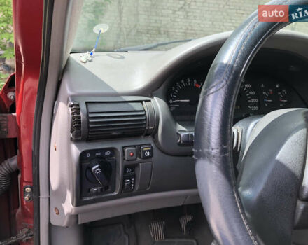 Красный Опель Астра, объемом двигателя 1.6 л и пробегом 332 тыс. км за 2100 $, фото 42 на Automoto.ua