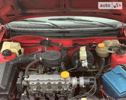 Красный Опель Астра, объемом двигателя 1.4 л и пробегом 333 тыс. км за 1250 $, фото 1 на Automoto.ua