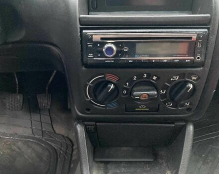 Красный Опель Астра, объемом двигателя 1.6 л и пробегом 256 тыс. км за 1200 $, фото 5 на Automoto.ua