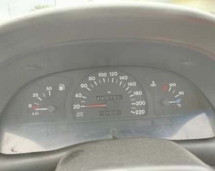 Красный Опель Астра, объемом двигателя 1.4 л и пробегом 443 тыс. км за 600 $, фото 7 на Automoto.ua