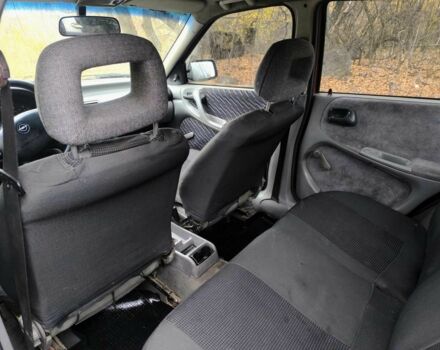 Красный Опель Астра, объемом двигателя 1.8 л и пробегом 200 тыс. км за 905 $, фото 4 на Automoto.ua