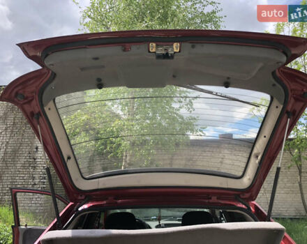 Красный Опель Астра, объемом двигателя 1.6 л и пробегом 332 тыс. км за 2100 $, фото 56 на Automoto.ua