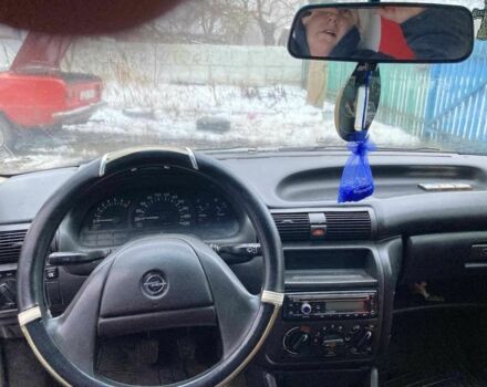 Красный Опель Астра, объемом двигателя 1.6 л и пробегом 256 тыс. км за 1200 $, фото 4 на Automoto.ua