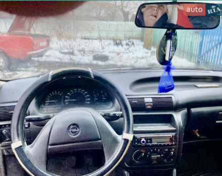 Красный Опель Астра, объемом двигателя 1.6 л и пробегом 265 тыс. км за 1200 $, фото 2 на Automoto.ua