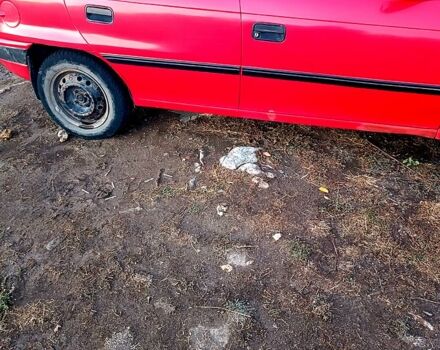 Красный Опель Астра, объемом двигателя 1.6 л и пробегом 215 тыс. км за 2000 $, фото 1 на Automoto.ua