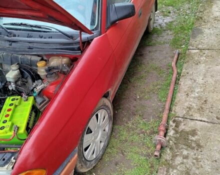 Красный Опель Астра, объемом двигателя 1.4 л и пробегом 40 тыс. км за 600 $, фото 7 на Automoto.ua