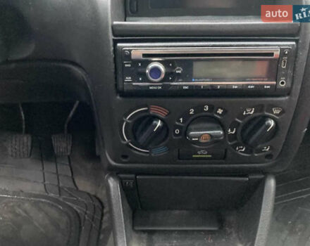 Красный Опель Астра, объемом двигателя 1.6 л и пробегом 265 тыс. км за 1200 $, фото 1 на Automoto.ua