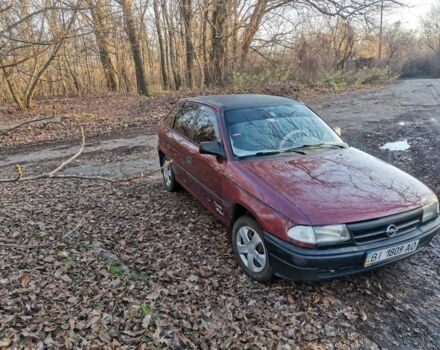 Красный Опель Астра, объемом двигателя 1.4 л и пробегом 350 тыс. км за 1700 $, фото 1 на Automoto.ua