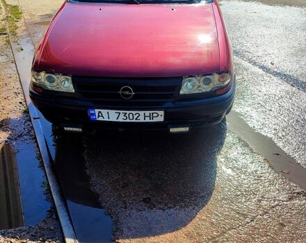Красный Опель Астра, объемом двигателя 1.6 л и пробегом 360 тыс. км за 1500 $, фото 2 на Automoto.ua