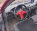 Красный Опель Астра, объемом двигателя 1 л и пробегом 111 тыс. км за 2300 $, фото 1 на Automoto.ua