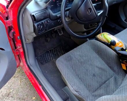 Красный Опель Астра, объемом двигателя 1.6 л и пробегом 200 тыс. км за 1850 $, фото 5 на Automoto.ua