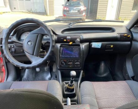 Червоний Опель Астра, об'ємом двигуна 1.6 л та пробігом 400 тис. км за 1500 $, фото 7 на Automoto.ua