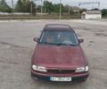 Красный Опель Астра, объемом двигателя 1.8 л и пробегом 340 тыс. км за 1000 $, фото 1 на Automoto.ua