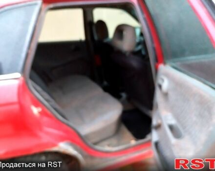 Червоний Опель Астра, об'ємом двигуна 1.4 л та пробігом 1 тис. км за 1350 $, фото 7 на Automoto.ua
