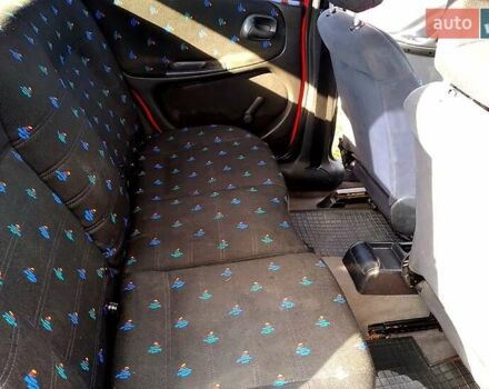 Червоний Опель Астра, об'ємом двигуна 1.6 л та пробігом 226 тис. км за 2500 $, фото 2 на Automoto.ua