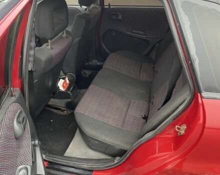 Красный Опель Астра, объемом двигателя 1.6 л и пробегом 264 тыс. км за 1200 $, фото 8 на Automoto.ua