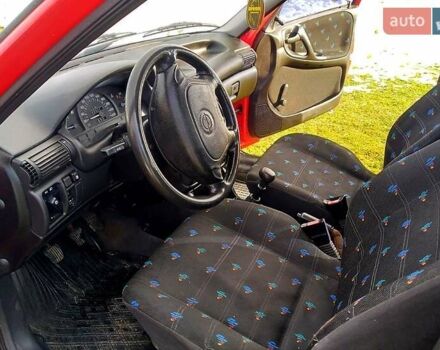 Червоний Опель Астра, об'ємом двигуна 1.6 л та пробігом 226 тис. км за 2500 $, фото 5 на Automoto.ua