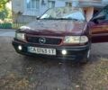 Красный Опель Астра, объемом двигателя 1.6 л и пробегом 300 тыс. км за 1800 $, фото 1 на Automoto.ua