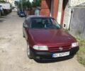 Красный Опель Астра, объемом двигателя 1.6 л и пробегом 320 тыс. км за 1200 $, фото 4 на Automoto.ua