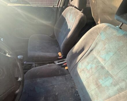 Красный Опель Астра, объемом двигателя 1.6 л и пробегом 400 тыс. км за 550 $, фото 7 на Automoto.ua