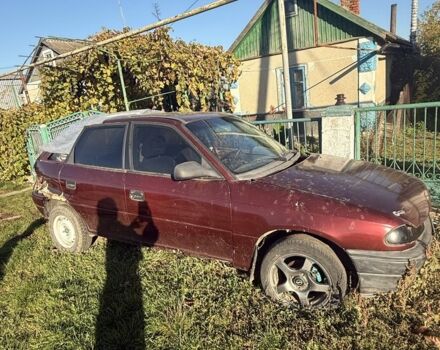 Красный Опель Астра, объемом двигателя 1.6 л и пробегом 400 тыс. км за 550 $, фото 1 на Automoto.ua