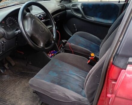 Красный Опель Астра, объемом двигателя 1.6 л и пробегом 555 тыс. км за 900 $, фото 5 на Automoto.ua