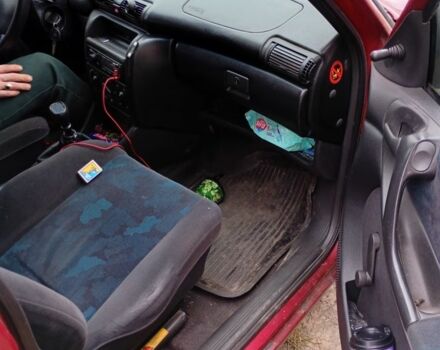 Красный Опель Астра, объемом двигателя 1.6 л и пробегом 555 тыс. км за 900 $, фото 4 на Automoto.ua