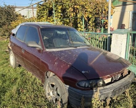 Красный Опель Астра, объемом двигателя 1.6 л и пробегом 400 тыс. км за 550 $, фото 3 на Automoto.ua