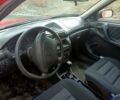 Красный Опель Астра, объемом двигателя 1.4 л и пробегом 280 тыс. км за 2000 $, фото 6 на Automoto.ua