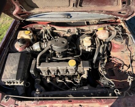 Красный Опель Астра, объемом двигателя 1.6 л и пробегом 400 тыс. км за 550 $, фото 5 на Automoto.ua