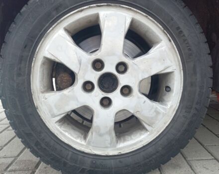 Красный Опель Астра, объемом двигателя 1.6 л и пробегом 396 тыс. км за 1299 $, фото 4 на Automoto.ua