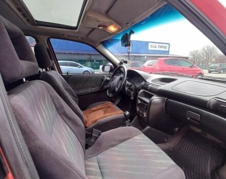 Красный Опель Астра, объемом двигателя 1.6 л и пробегом 396 тыс. км за 1299 $, фото 11 на Automoto.ua