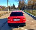 Красный Опель Астра, объемом двигателя 1.4 л и пробегом 402 тыс. км за 3000 $, фото 2 на Automoto.ua