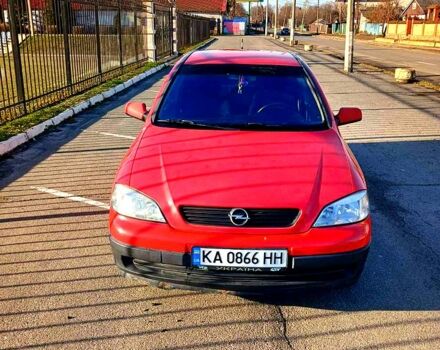 Красный Опель Астра, объемом двигателя 1.4 л и пробегом 402 тыс. км за 3000 $, фото 6 на Automoto.ua