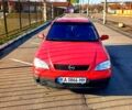 Красный Опель Астра, объемом двигателя 1.4 л и пробегом 402 тыс. км за 3000 $, фото 6 на Automoto.ua