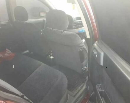 Красный Опель Астра, объемом двигателя 1.6 л и пробегом 181 тыс. км за 4900 $, фото 6 на Automoto.ua