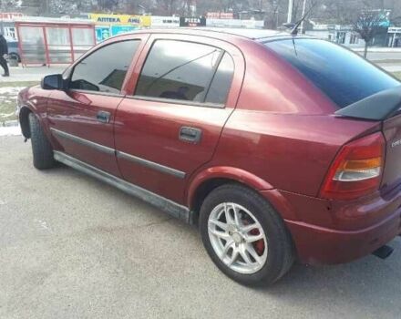 Красный Опель Астра, объемом двигателя 1.6 л и пробегом 181 тыс. км за 4900 $, фото 1 на Automoto.ua