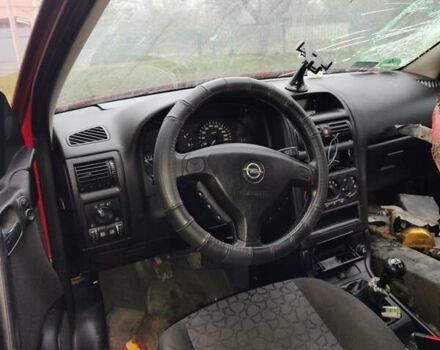 Красный Опель Астра, объемом двигателя 1.8 л и пробегом 209 тыс. км за 1700 $, фото 9 на Automoto.ua