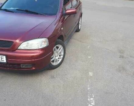 Красный Опель Астра, объемом двигателя 1.6 л и пробегом 181 тыс. км за 4900 $, фото 3 на Automoto.ua